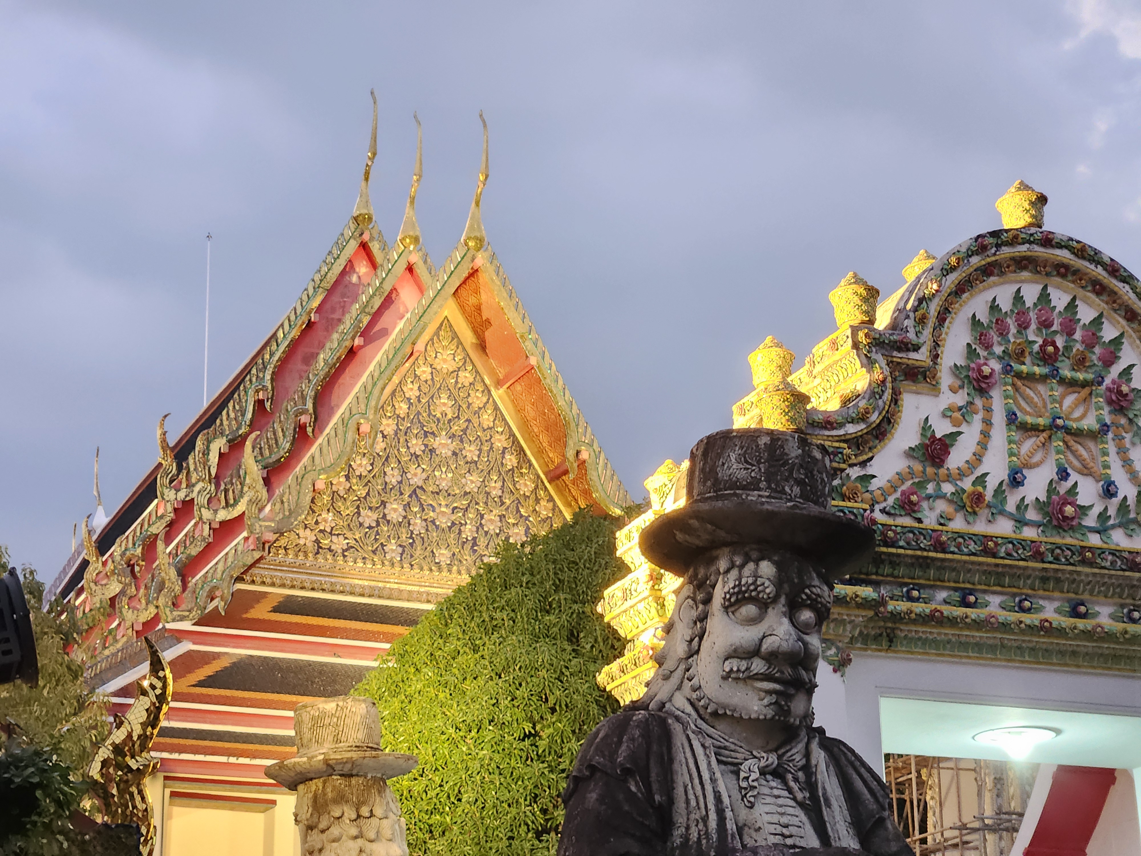 Cool photo of a temple and a statue