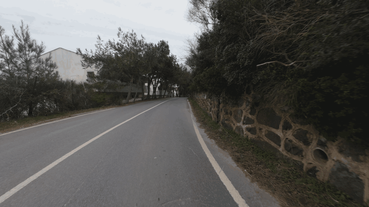 Empty houses at my left and nice wall at my right
